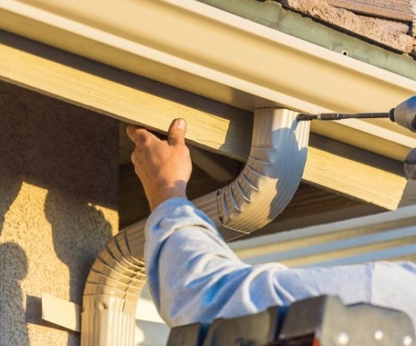 Installing Rain Gutters with a Drill