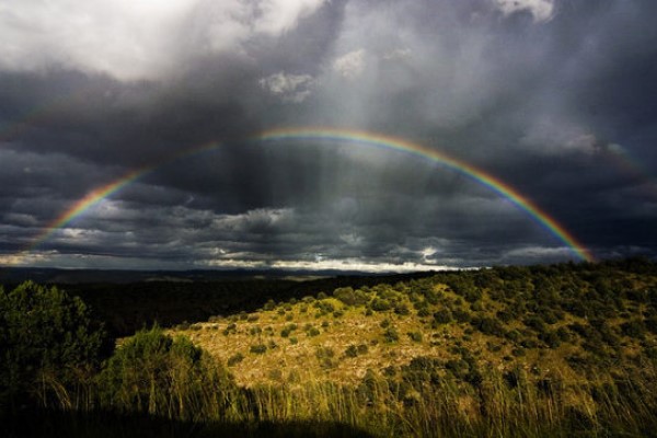 Monsoon Rains Developing a Rainbow Over New Mexico Vista