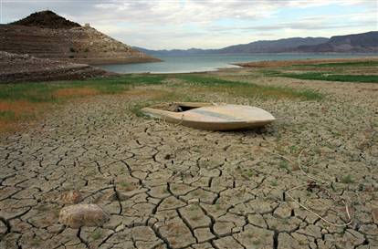 Dried Up Lake with a Boat Stuck in the Dry Earth